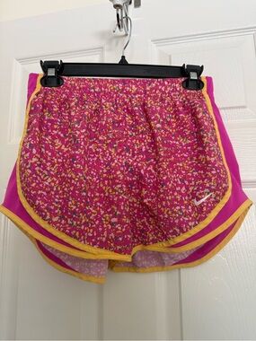 Nike Women's Fuchsia Floral Athletic Shorts with Yellow Trim